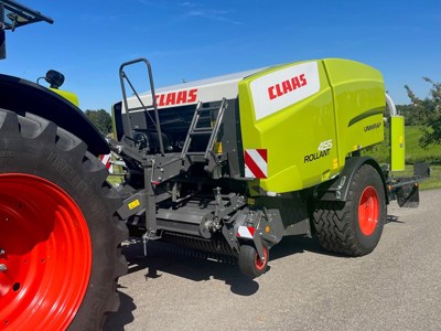 Rundballen - Kombipresse Claas Rollant 455 RC Uniwrap mit Folienbindung